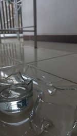 High angle view of drinking glass on table at home