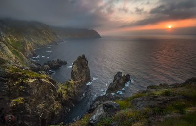 Scenic view of sea against sky during sunset