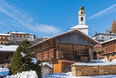 Historic village of sauris di sotto in the snow. winter dream. italy