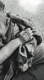 Low section of man lying on floor