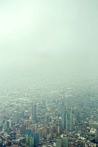 Aerial view of cityscape against clear sky