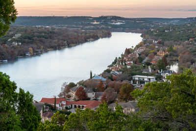 High angle view of river amidst buildings in town