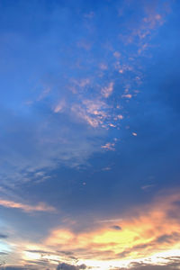 Low angle view of clouds in sky during sunset