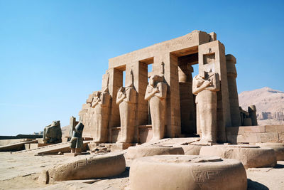 Statue of historic building against clear sky