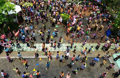 High angle view of people on street in city