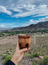 Close-up of hand holding drink