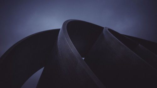 Low angle view of structure against sky at night