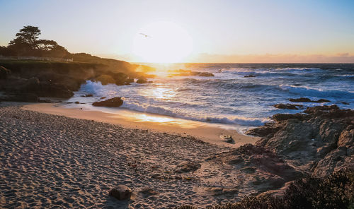 Scenic view of sea against sky during sunset