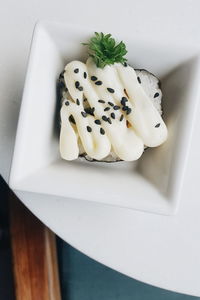 High angle view of sushi served in bowl on table