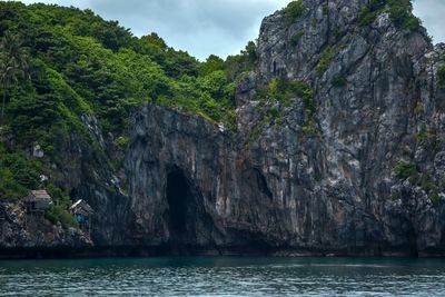 Scenic view of rocks by sea