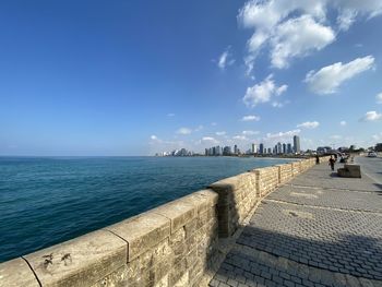 Scenic view of sea against blue sky