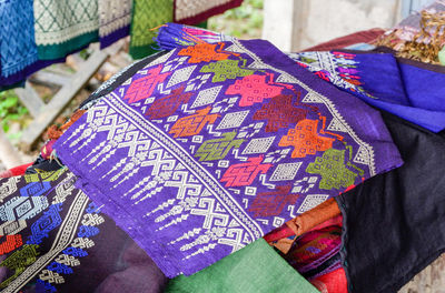 High angle view of multi colored textiles for sale