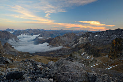 Scenic view of mountains against sky during sunset