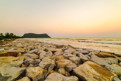 Scenic view of sea against clear sky during sunset