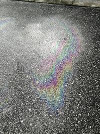 High angle view of rainbow on road