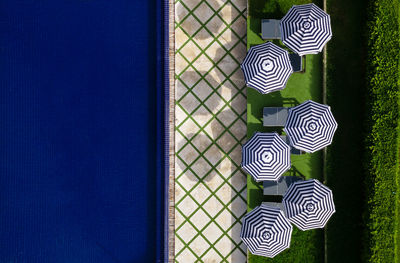 Directly above shot of tiled floor against blue wall