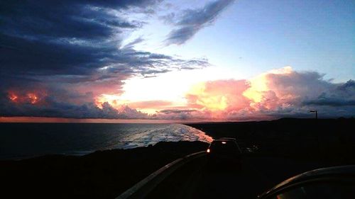 Scenic view of sunset over river