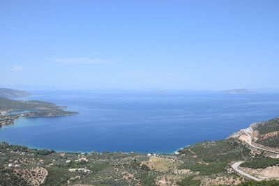 High angle view of sea against blue sky