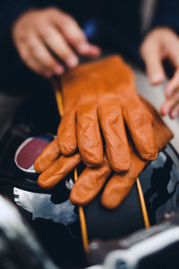 Cropped hand of woman holding food