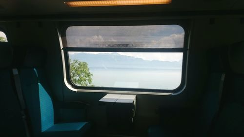 Road seen through train window