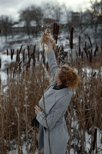 Person standing on snow covered land