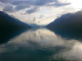 Scenic view of lake against cloudy sky