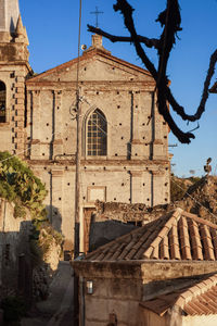 Exterior of historic building against clear sky