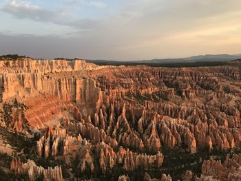 Scenic view of landscape against sky during sunset