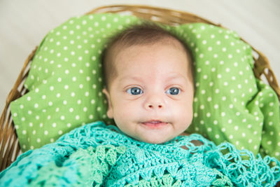 Close-up of cute boy in basket