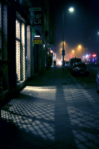 Illuminated street at night