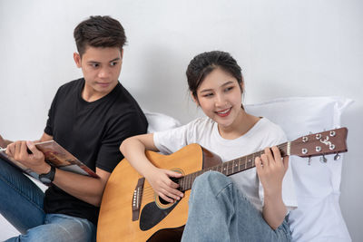 Young man playing guitar