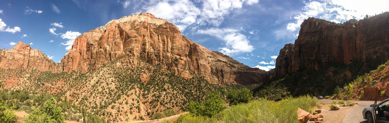 Low angle view of rocky mountain against sky