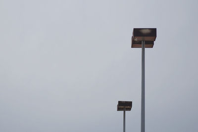 Low angle view of basketball hoop against clear sky