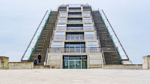 Low angle view of modern building against clear sky