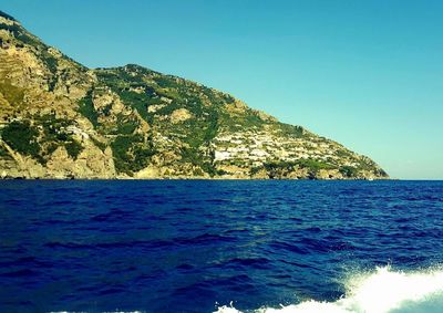 View of sea against blue sky