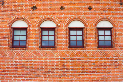 Full frame shot of brick wall with windows
