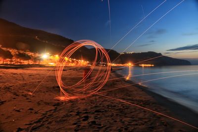 Sparks of circular lights on beach