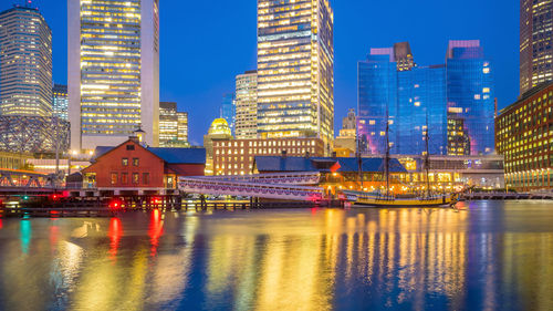 Illuminated buildings at waterfront