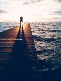 Scenic view of sea at sunset