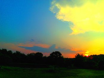 Scenic view of landscape at sunset