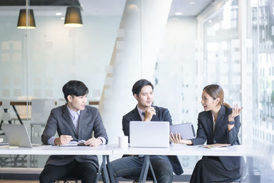 Group of people sitting in office