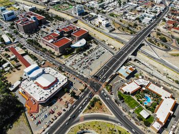 High angle view of street amidst buildings in city