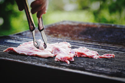 Close-up of food being prepared on the grill outdoors 