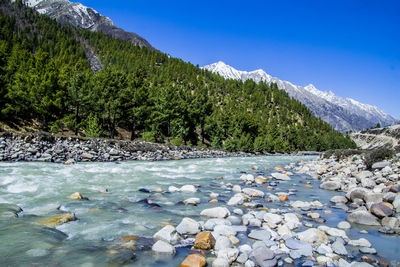 Scenic view of river against sky