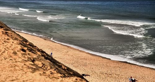 High angle view of waves on beach