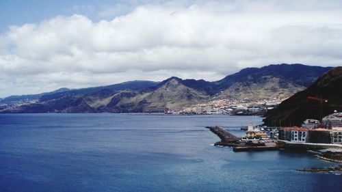 Scenic view of sea against cloudy sky