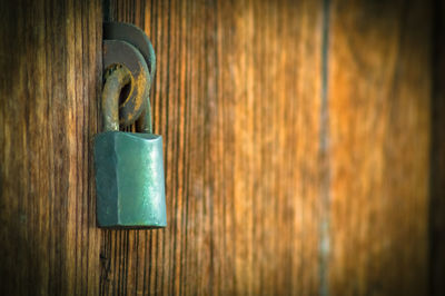 Close-up of padlock on door