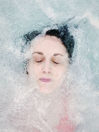 Portrait of a woman in water