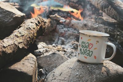 Coffee cup on rock