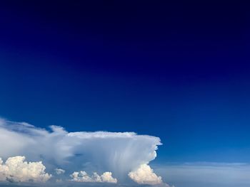 Drifting.low angle view of clouds in sky